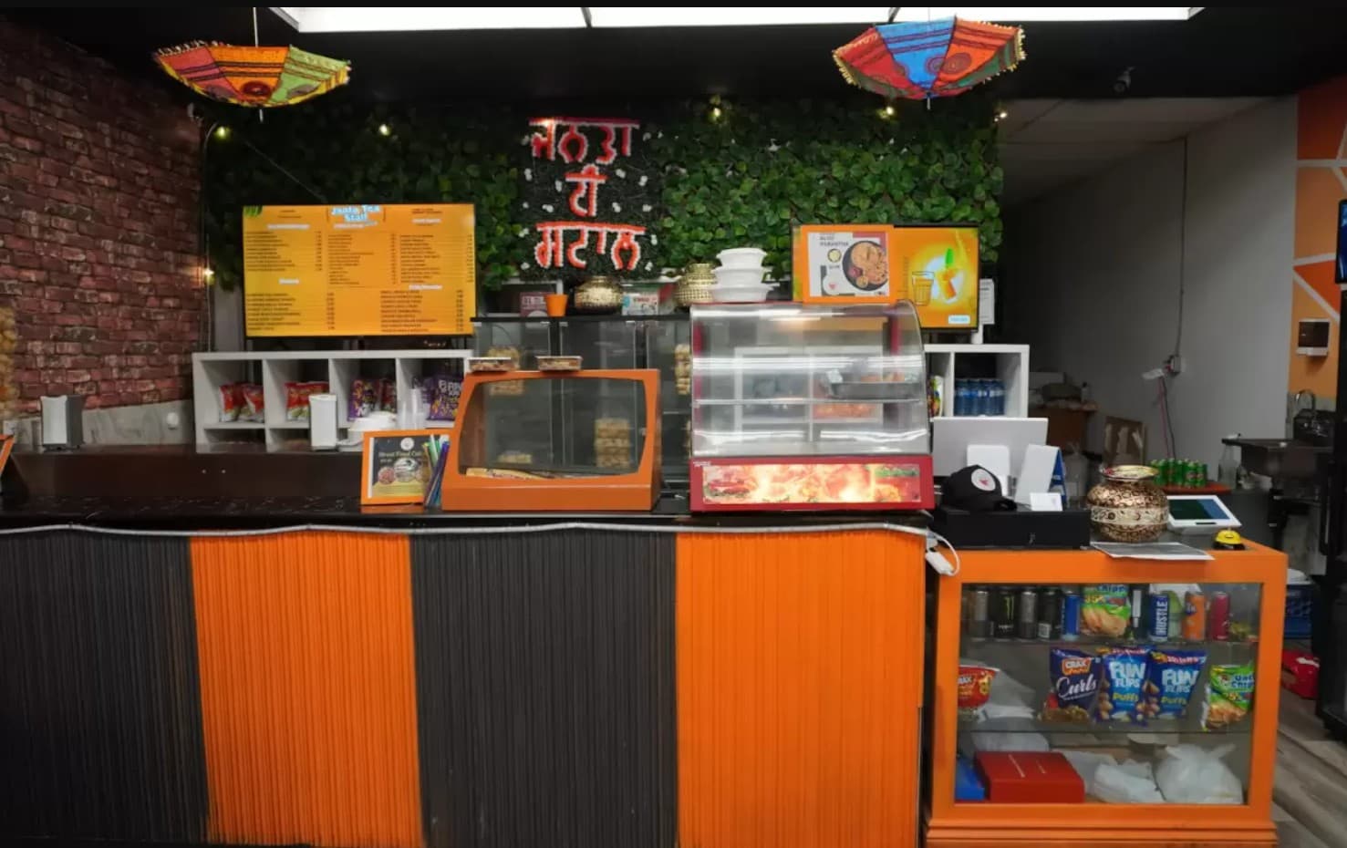 Assorted Indian street food plates including chaat and momos